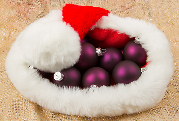 Image showing Santas hat filled with Christmas balls