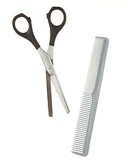 Image showing Hair cutting shears and comb