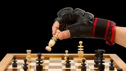 Image showing Playing chess in freefight gloves, isolated