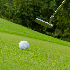 Image showing Golf ball on front of a driver