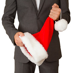 Image showing Business man with a santa hat 