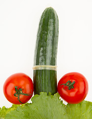 Image showing Tomatoes and cucumber in a condom