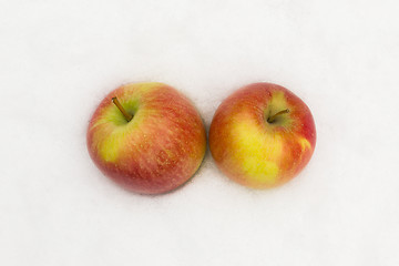 Image showing Red apples in the snow