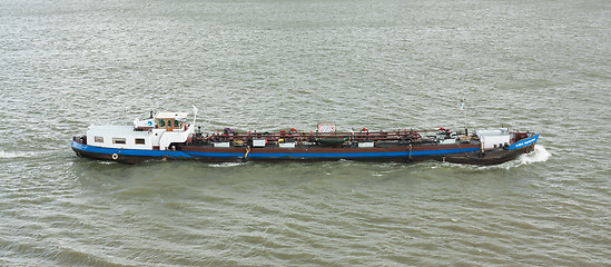 Image showing Small chemical tanker sailing in the port of Rotterdam (Holland)