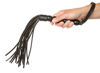 Image showing Strict Black Leather Flogging Whip in woman's hand