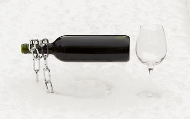 Image showing Bottle of red wine and wineglasses isolated