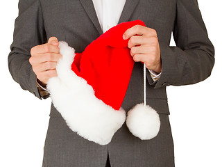 Image showing Business man with a santa hat 