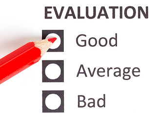 Image showing Red pencil on a evaluationform