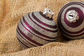 Image showing Two purple Christmas balls isolated