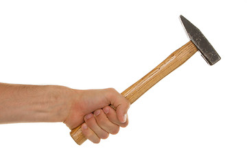 Image showing Man holding a old wooden hammer