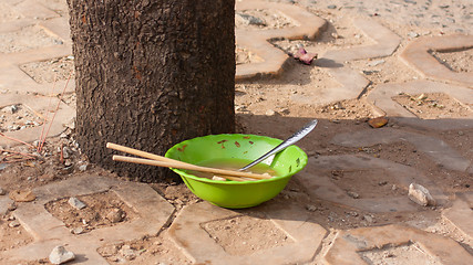 Image showing Abandoned bowl of soup on the streets of Saigon