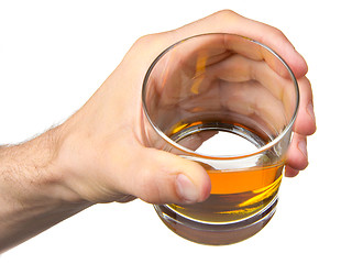 Image showing Glass of whisky in hand
