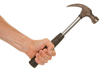 Image showing Man holding a old metal hammer