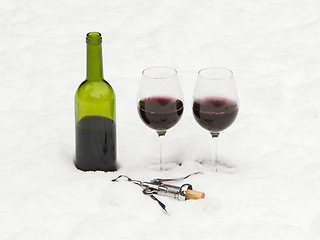 Image showing Bottle of red wine and wineglasses isolated