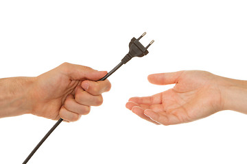 Image showing Man giving electric plug