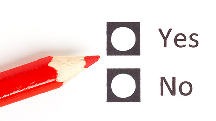 Image showing Red pencil choosing between yes or no
