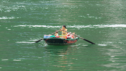 Image showing HA LONG BAY, VIETNAM AUG 10, 2012 - Food seller in boat. Many Vi