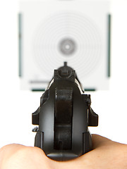 Image showing Handgun aimed on a shooting target 