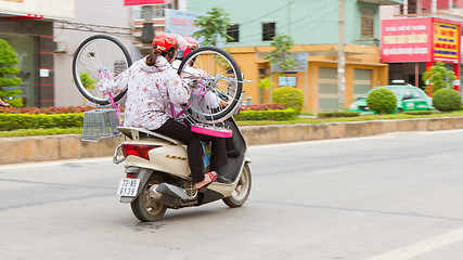 Image showing DONG HOI, VIETNAM, 7 AUGUST 2012 - Vietnamese family with a bicy