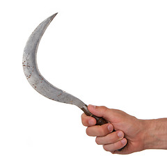 Image showing Man holding a rusted sickle