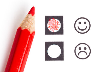 Image showing Red pencil choosing the right smiley