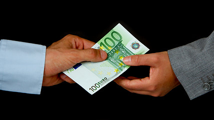 Image showing Man giving 100 euro to a woman (business)