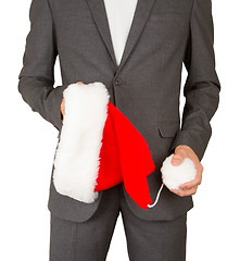 Image showing Business man with a santa hat 