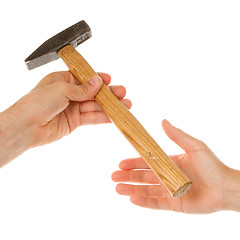 Image showing Man giving woman hammer