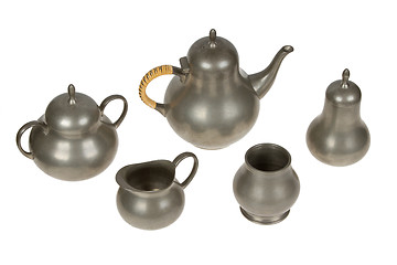 Image showing Very old tin tea set full of scratches