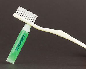 Image showing Toothbrush and green toothpaste isolated