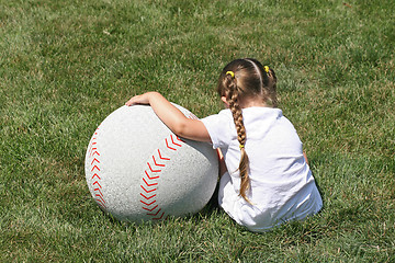 Image showing Small Girl Large Baseball