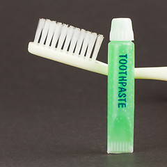 Image showing Toothbrush and green toothpaste isolated
