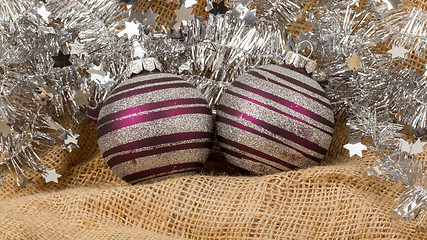 Image showing Two purple Christmas balls isolated