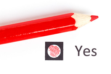 Image showing Red pencil choosing between yes or no