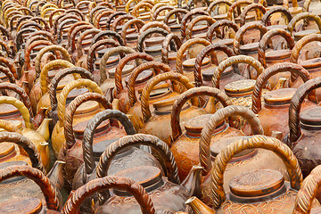 Image showing Many teapots waiting to be sold at a factory