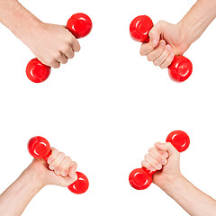 Image showing Red dumbbells in the hands of a man, isolated