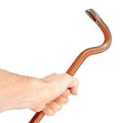 Image showing Hand holding old red crowbar