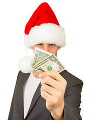 Image showing Business man with a santa hat, santa's crisis budget