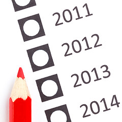 Image showing Red pencil choosing a date 