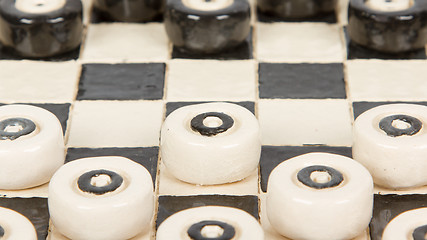 Image showing Very old game of checkers, pottery