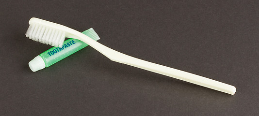 Image showing Toothbrush and green toothpaste isolated