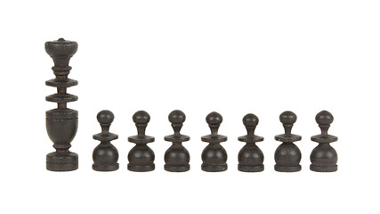 Image showing Set of old handcarved chess pieces isolated