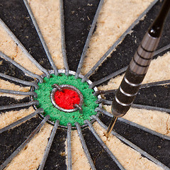 Image showing Close-up of a very old dartboard