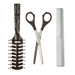 Image showing Cutting scissors or shears and black comb and a black brush