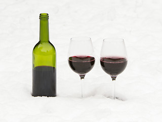 Image showing Bottle of red wine and wineglasses isolated