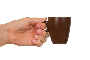 Image showing Man holding a cup of coffee