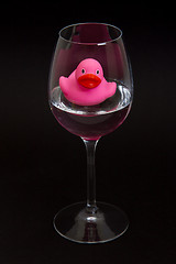 Image showing Pink rubber duck in a wineglass