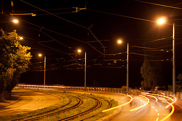 Image showing Speeding cars at night