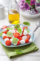 Image showing Tomato salad with mozzarella and basil