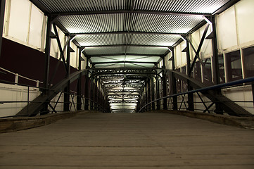 Image showing vanishing metal hallway